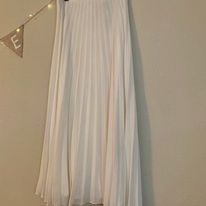 Long creamy white skirt. New with tags. Size 8